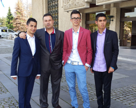 Young men participants in houuse of opportunity programme on a ball with the president